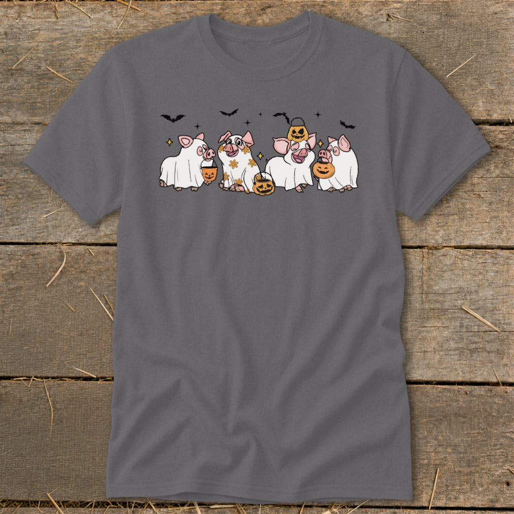 Four pigs dressed as ghosts hold jack-o'-lanterns and candy buckets, with bats above.