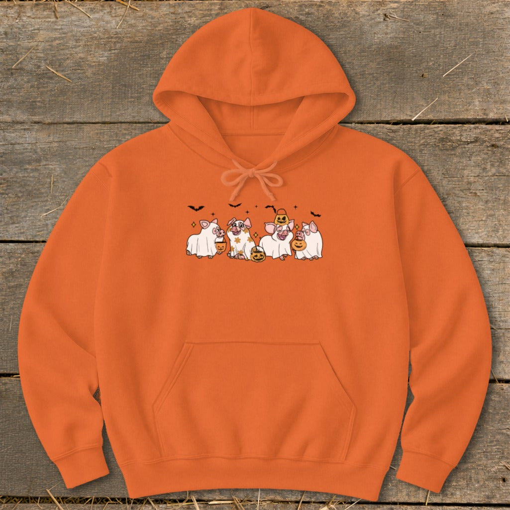 Orange hoodie with a Halloween-themed graphic of pigs dressed as ghosts and holding pumpkins.