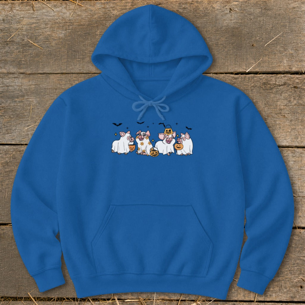 Five pigs dressed as ghosts with pumpkins and bats on a blue hoodie.