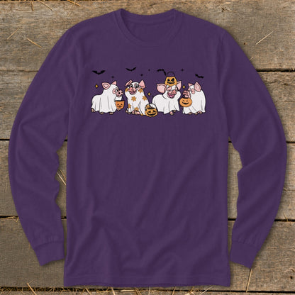 Four cartoon pigs in Halloween costumes holding candy buckets, against a dark background.