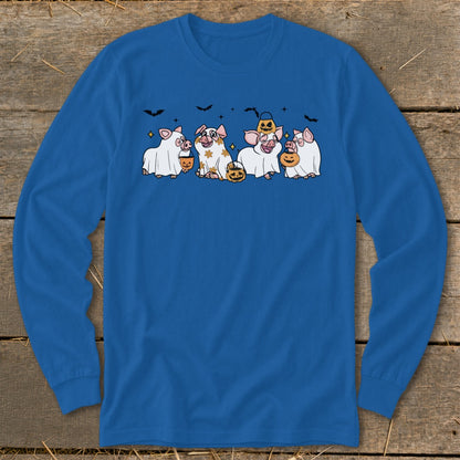 Four pigs in ghost costumes with pumpkins and bats on a blue long-sleeve shirt.
