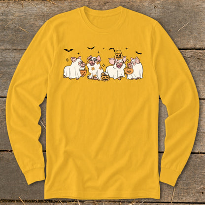 Five cartoon pigs in ghost costumes holding pumpkins on a yellow long-sleeve shirt.