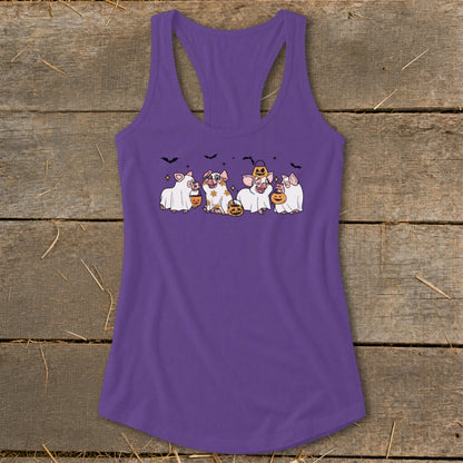 Purple tank top with cartoon pigs dressed in Halloween costumes.