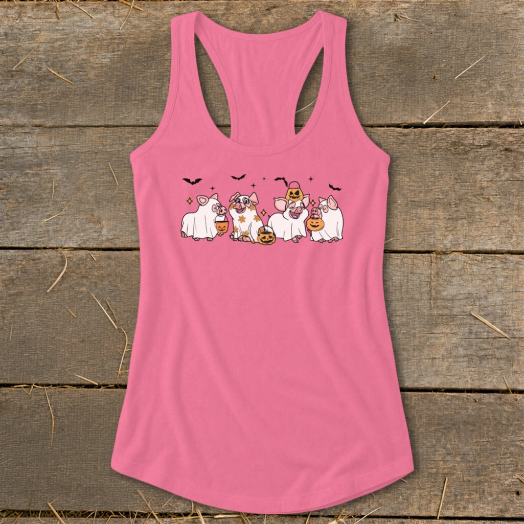 Pink tank top with cartoon pigs dressed as ghosts holding candy buckets.