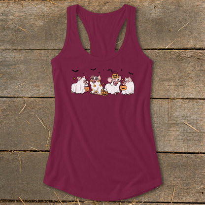 A burgundy tank top with a cartoon of five pigs in Halloween costumes.