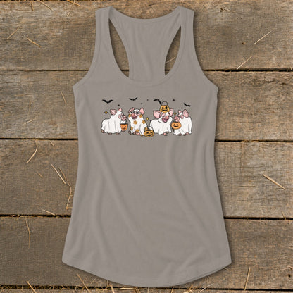 Five pigs in ghost costumes holding pumpkins, with bats overhead.
