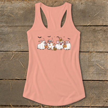 Peach tank top with graphic of pigs in ghost costumes holding pumpkins.