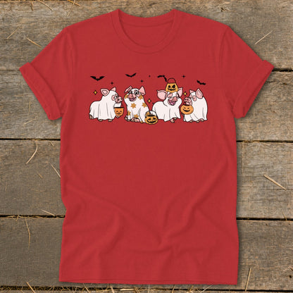 Red t-shirt with cartoon pigs dressed as ghosts carrying pumpkins.