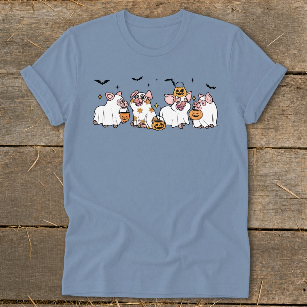 Five pigs in ghost costumes holding pumpkins and trick-or-treating with bats above.