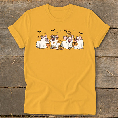 Five pigs dressed as ghosts hold jack-o'-lanterns and wear Halloween accessories.