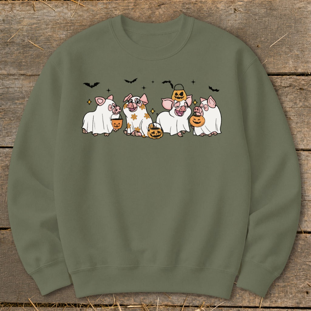 Five cute pigs dressed as ghosts holding pumpkins, with bats overhead.