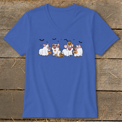 Five pigs dressed as ghosts carry pumpkins and bats on a blue t-shirt.