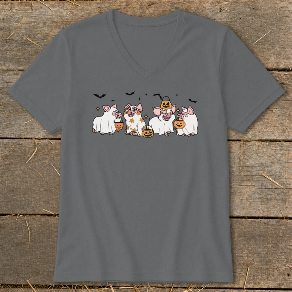 Five pigs in ghost costumes with pumpkins and bats, Halloween design.