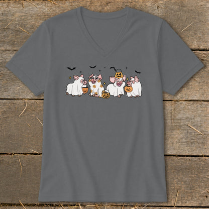 Five pigs in ghost costumes with pumpkins and bats, Halloween design.