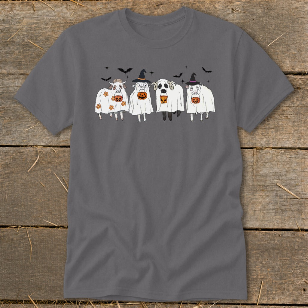 Four cartoon sheep in ghost costumes holding pumpkins, with bats and stars above.
