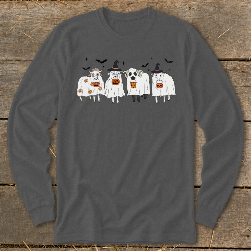 Four sheep dressed as ghosts with pumpkins, bats, and stars for Halloween.
