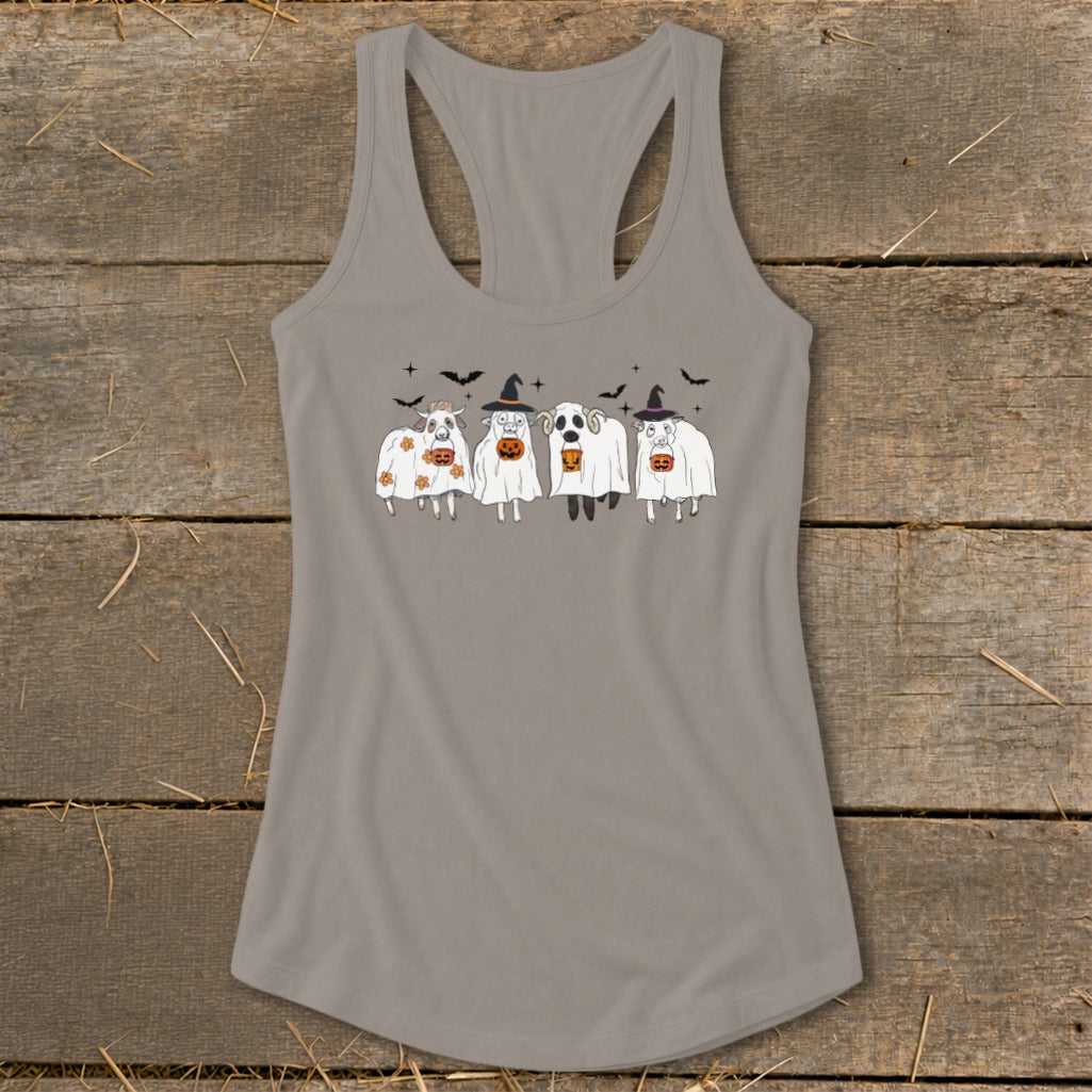 Four sheep wearing ghost costumes and holding jack-o'-lanterns.