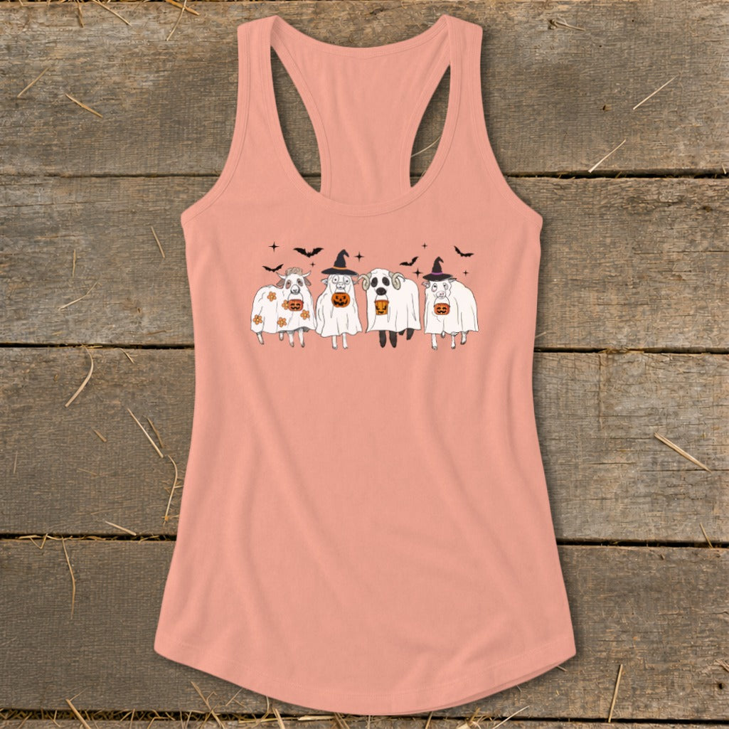 Four sheep dressed as ghosts hold pumpkins on a peach tank top.