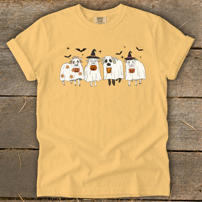 Yellow t-shirt with four ghost-costumed sheep holding pumpkins, bats above.