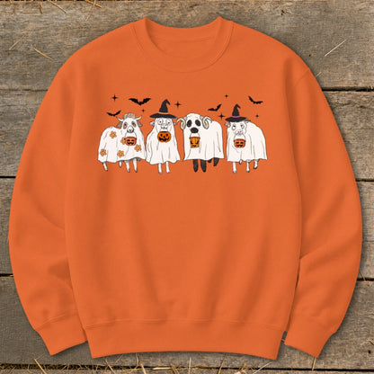 Orange sweatshirt with cartoon sheep in Halloween ghost costumes holding pumpkins.