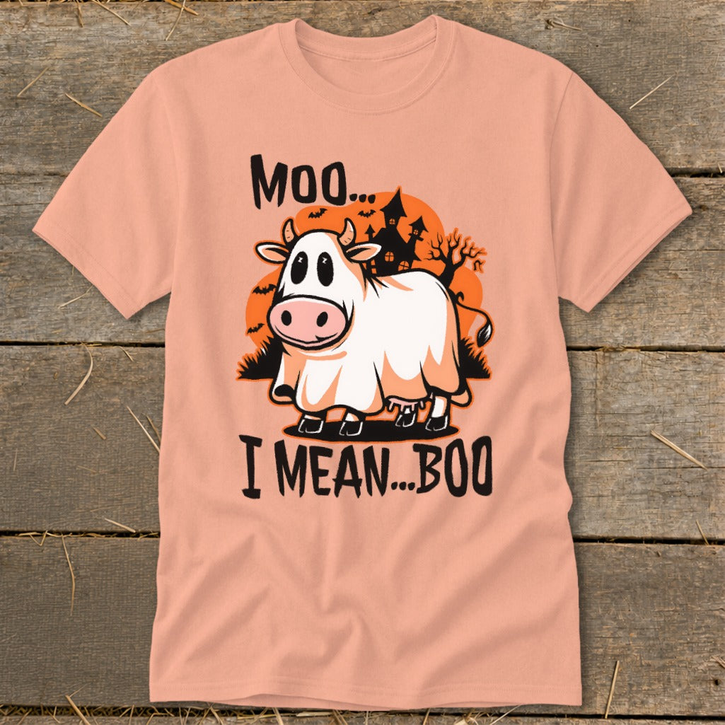 Cow dressed as a ghost on a peach t-shirt with "Moo... I mean... Boo" text.