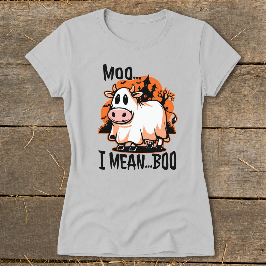 Cow wearing a ghost costume with text "Moo... I MEAN... BOO"