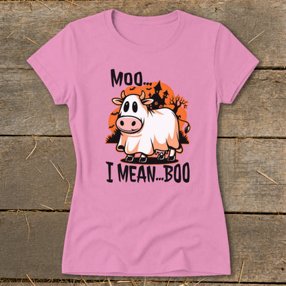 Pink t-shirt with a cow dressed as a ghost saying "Moo... I mean... Boo".