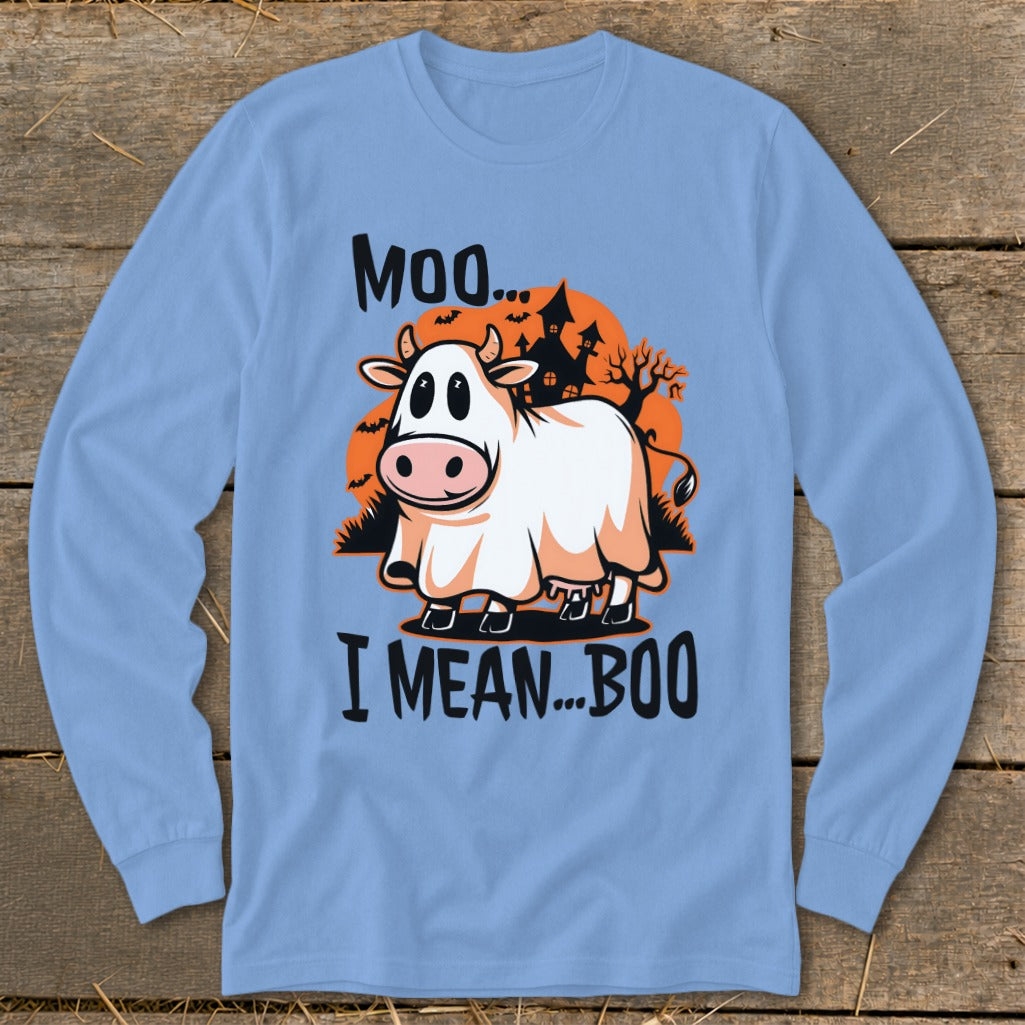 Cow dressed as ghost with text "Moo... I mean... Boo" and spooky background.