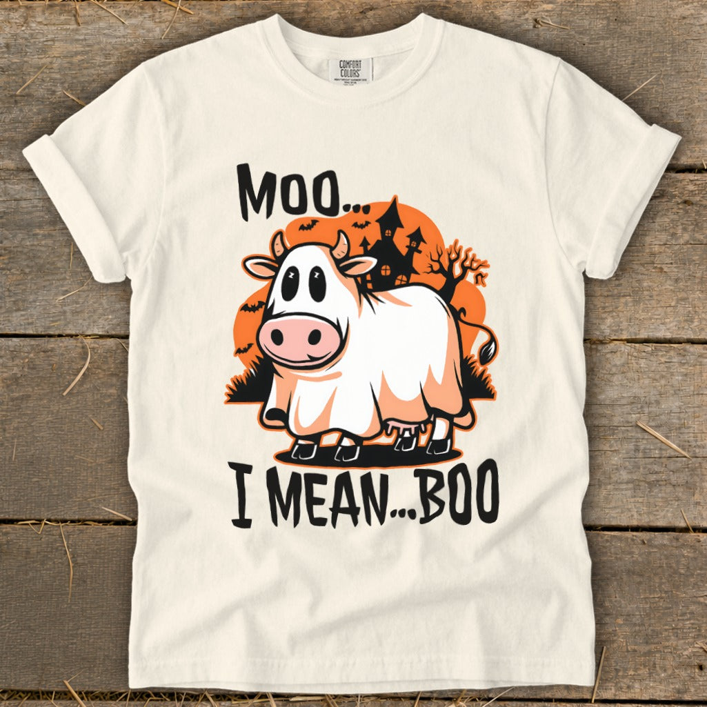 T-shirt graphic of cow in ghost costume with text "Moo... I MEAN...BOO".