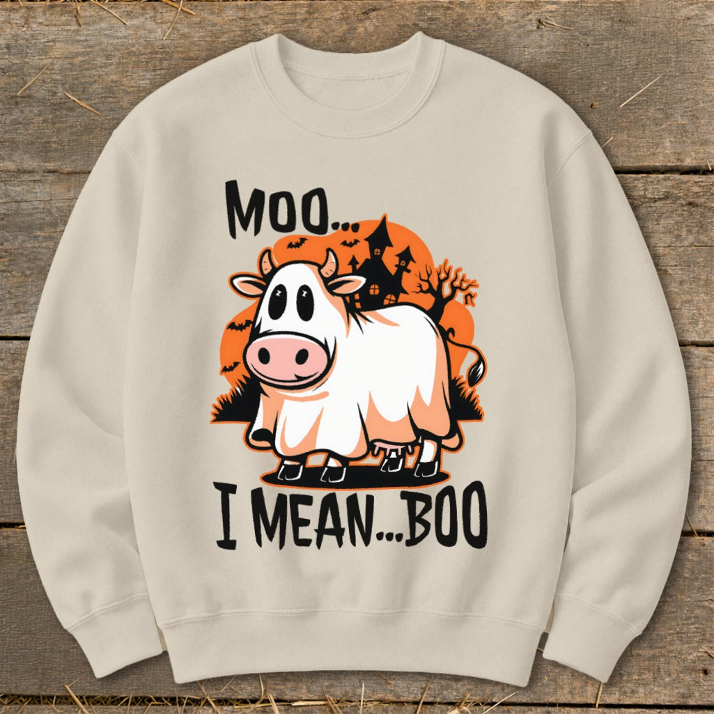 Cow in a ghost costume with text "MOO... I MEAN...BOO" and Halloween background.