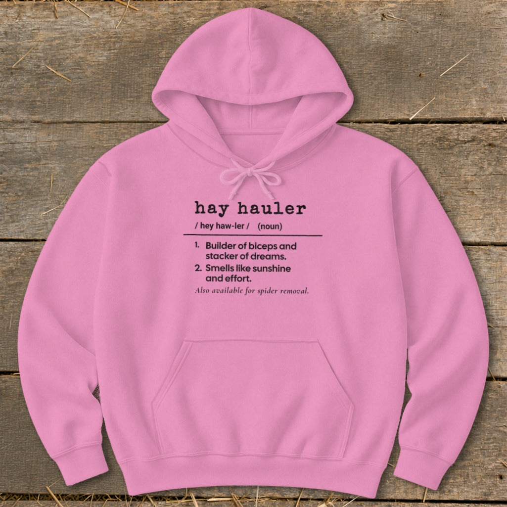 Pink hoodie with "hay hauler" definition: Builder of biceps, smells like sunshine.
