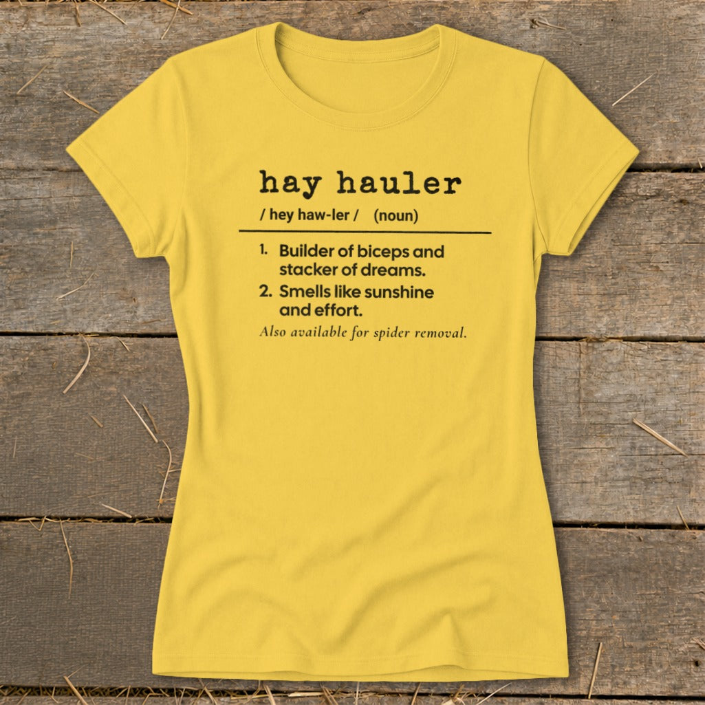 Yellow t-shirt with "hay hauler" definition: Builder, staker, sunshine, effort, spider removal.