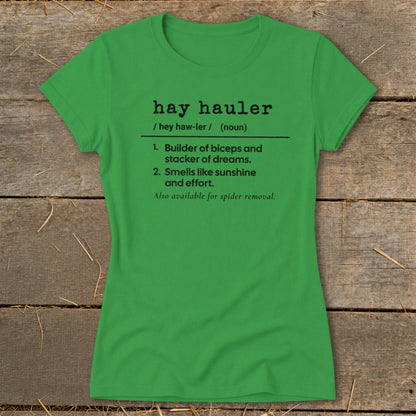 Green t-shirt with "hay hauler" definition including "Builder of biceps and staker of dreams."