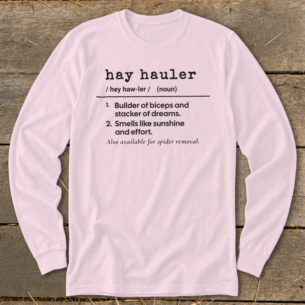 Pink long-sleeved shirt with definition of "hay hauler" text.
