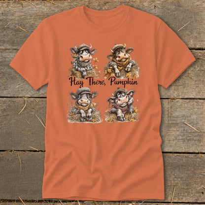 Four cartoon cows wear scarves and hats, with text "Hay There, Pumpkin".