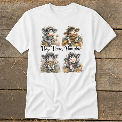 White t-shirt with four cows in hats and scarves and the text "Hay There, Pumpkin."