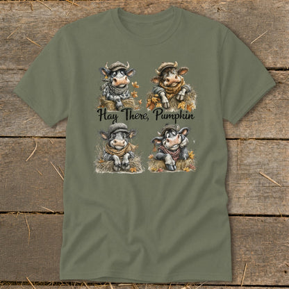 Four cows wearing hats and scarves with autumn leaves, text "Hay There, Pumpkin".