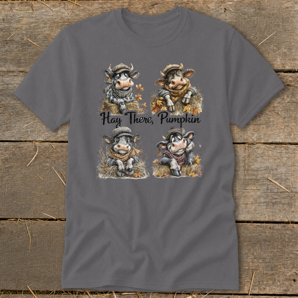 Four cartoon cows wearing hats and scarves, with text "Hay There, Pumpkin".