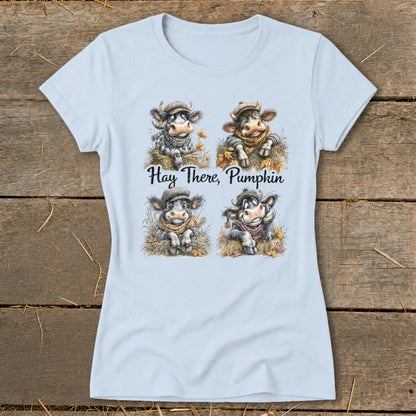 Light blue t-shirt with four cartoon cows and "Hay There, Pumpkin" text.