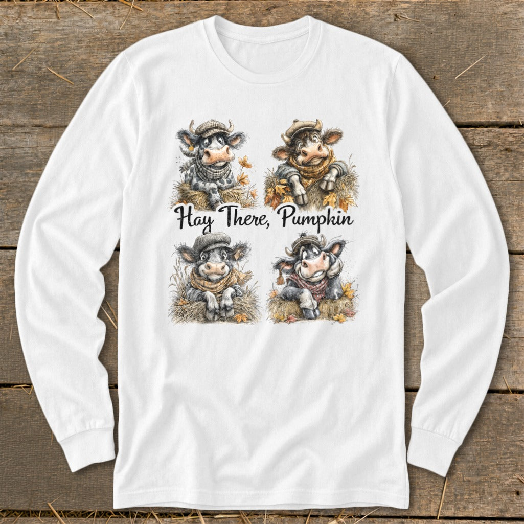 White long-sleeve shirt with four cows and "Hay There, Pumpkin" text.