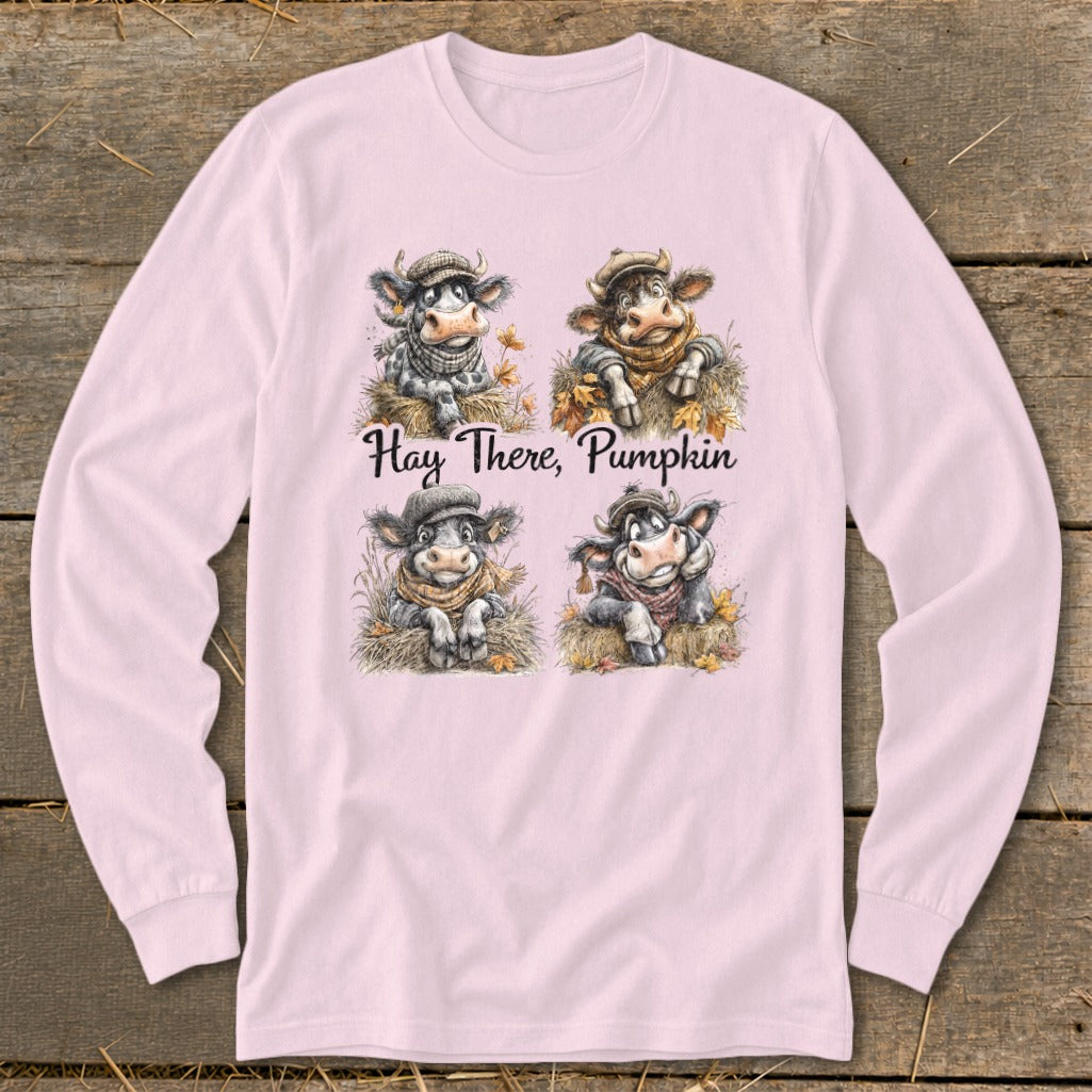 Four cartoon cows wearing hats and scarves, with "Hay There, Pumpkin" text.