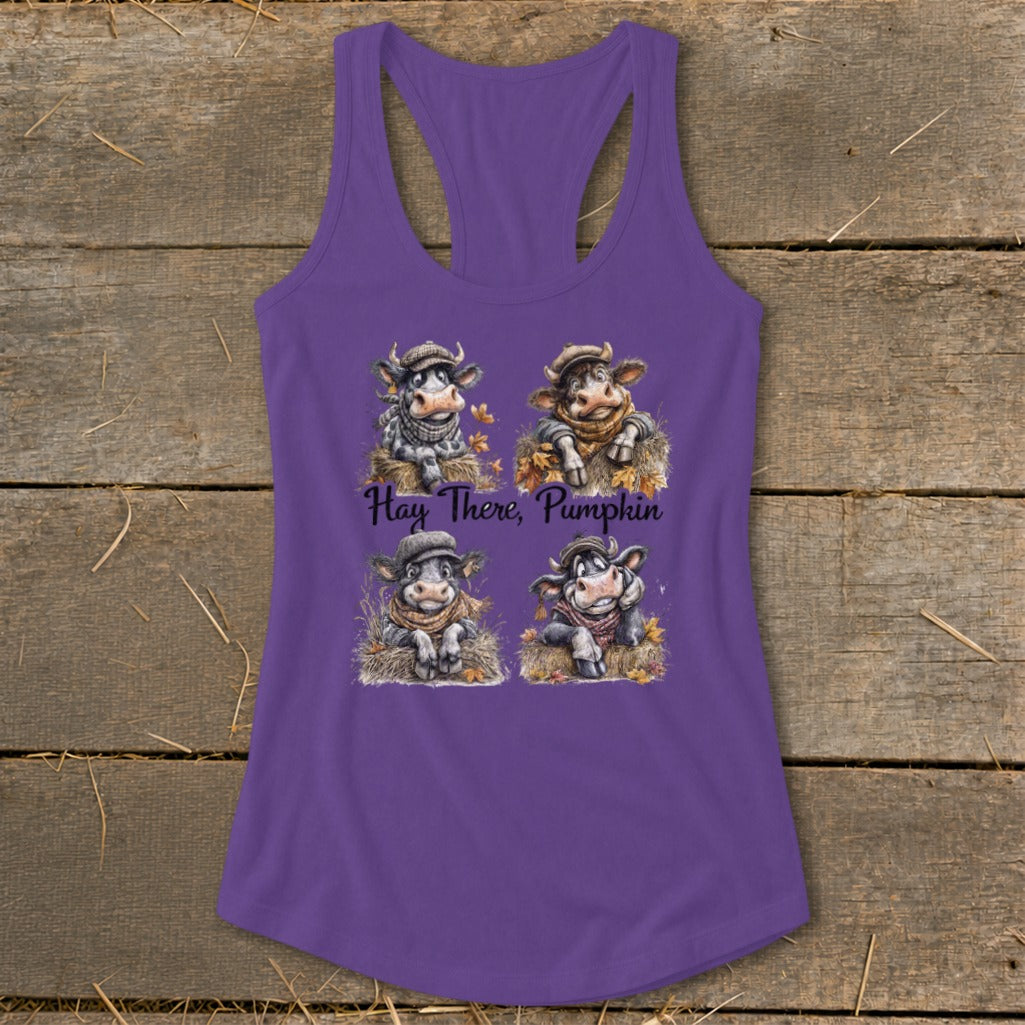 Purple tank top with four cartoon cows and text "Hay There, Pumpkin".