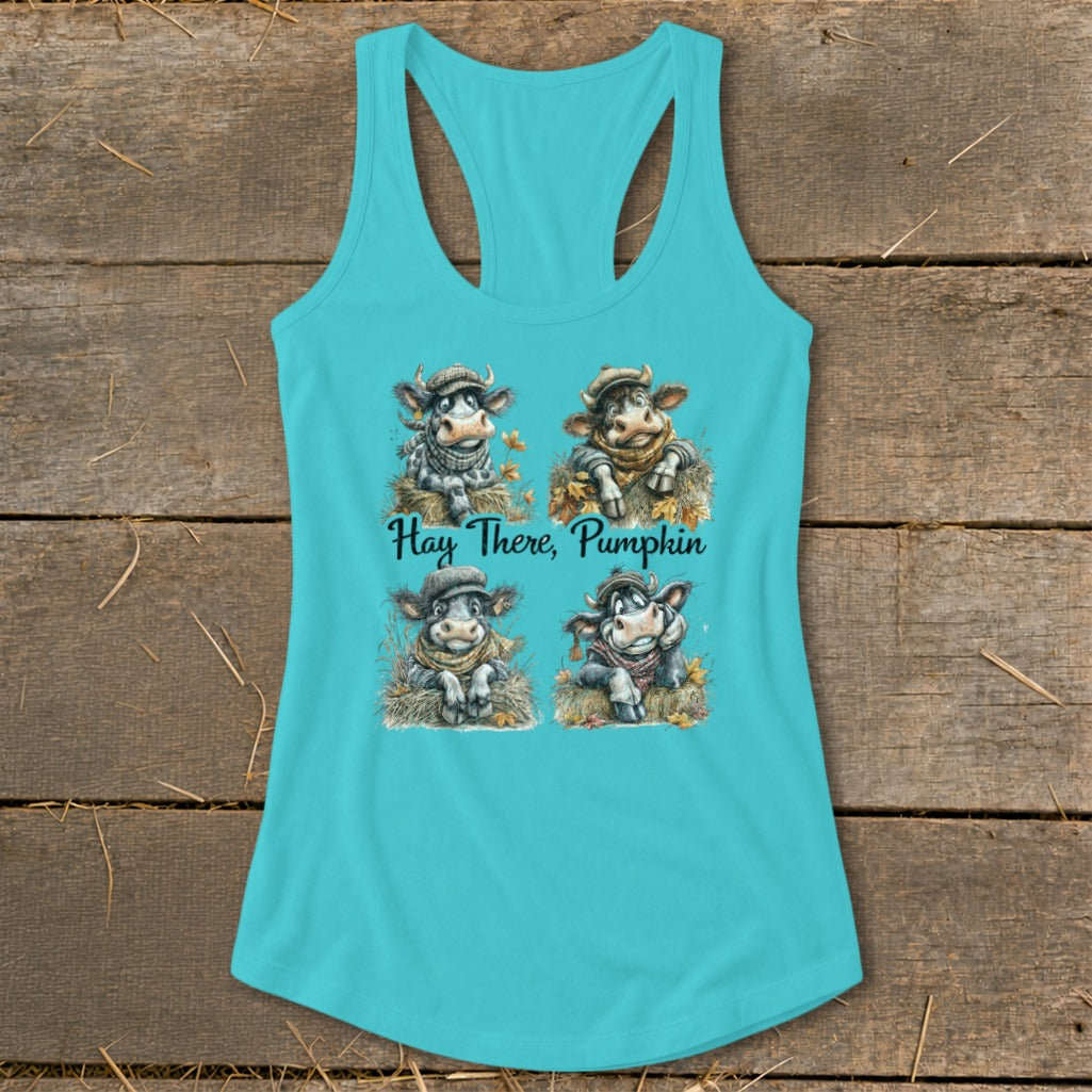 Turquoise tank top with four cartoon cows and the text "Hay There, Pumpkin."