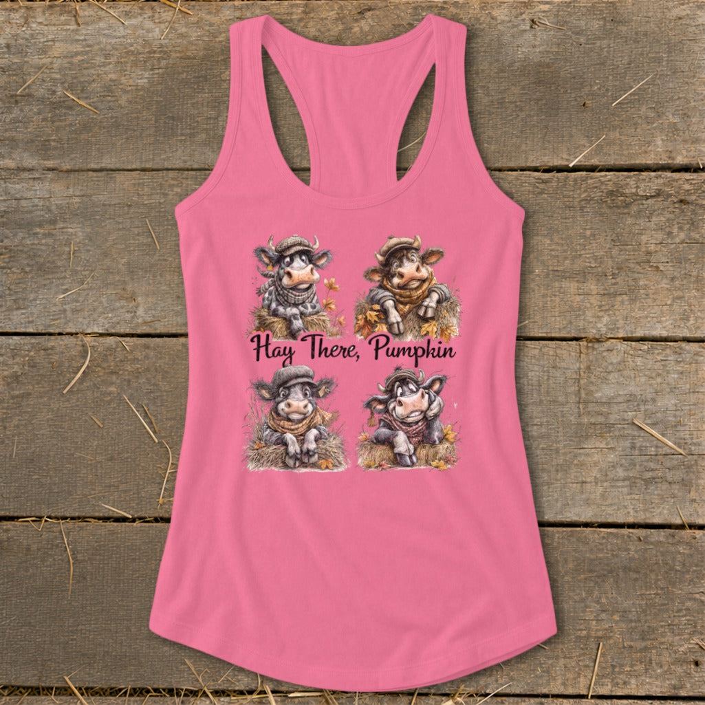 Pink tank top with four cartoon cows wearing hats and scarves and text "Hay There, Pumpkin."