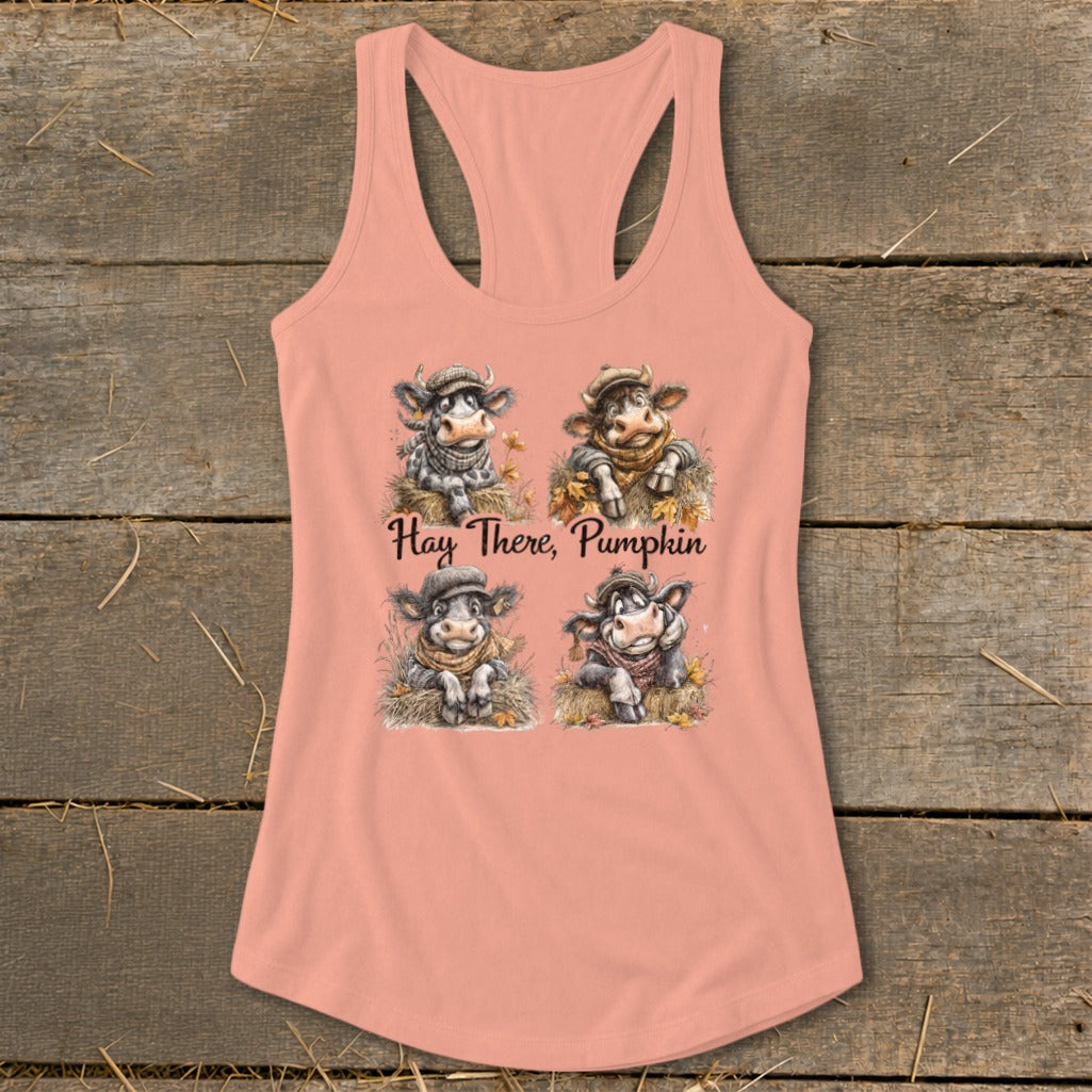 Pink tank top with four cartoon cows and "Hay There, Pumpkin" text.