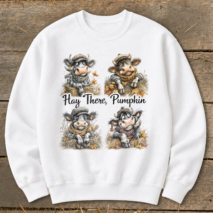 Four cows wearing scarves and hats, with "Hay There, Pumpkin" text.