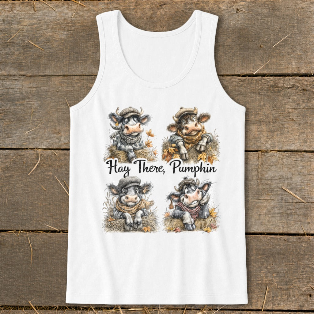Four cute cows wearing hats and scarves with text "Hay There, Pumpkin".