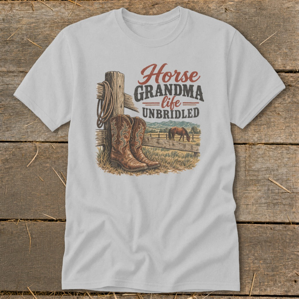Light gray t-shirt featuring a western graphic with cowboy boots, a horse, and the text Horse Grandma Life Unbridled.