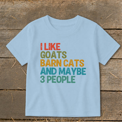 Light blue t-shirt with "I like goats barn cats and maybe 3 people" text.