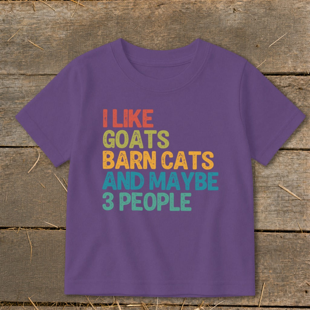 Purple t-shirt with text: I like goats, barn cats and maybe 3 people.
